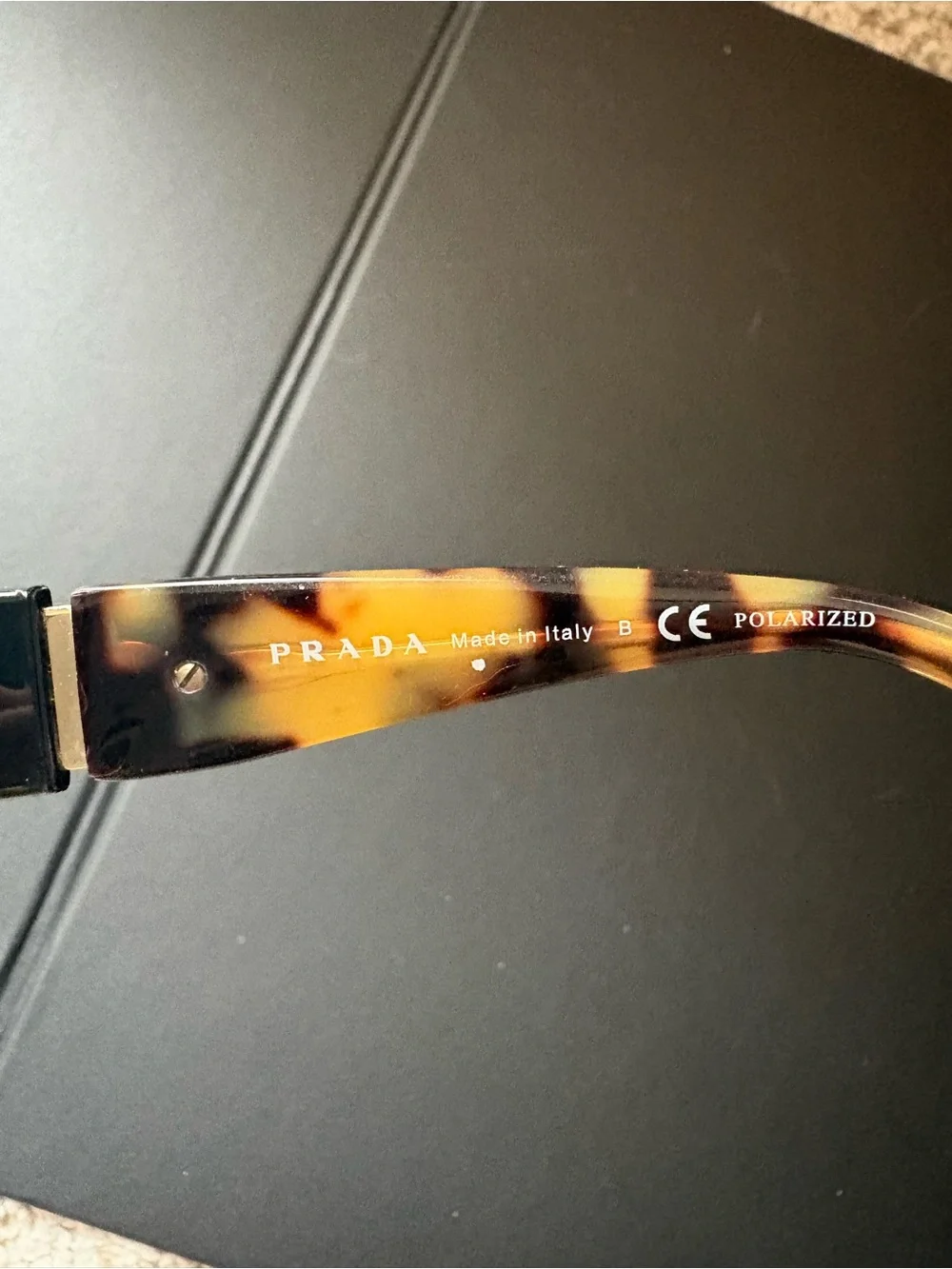 Prada Black Frame Sunglasses with Tortoiseshell Temples